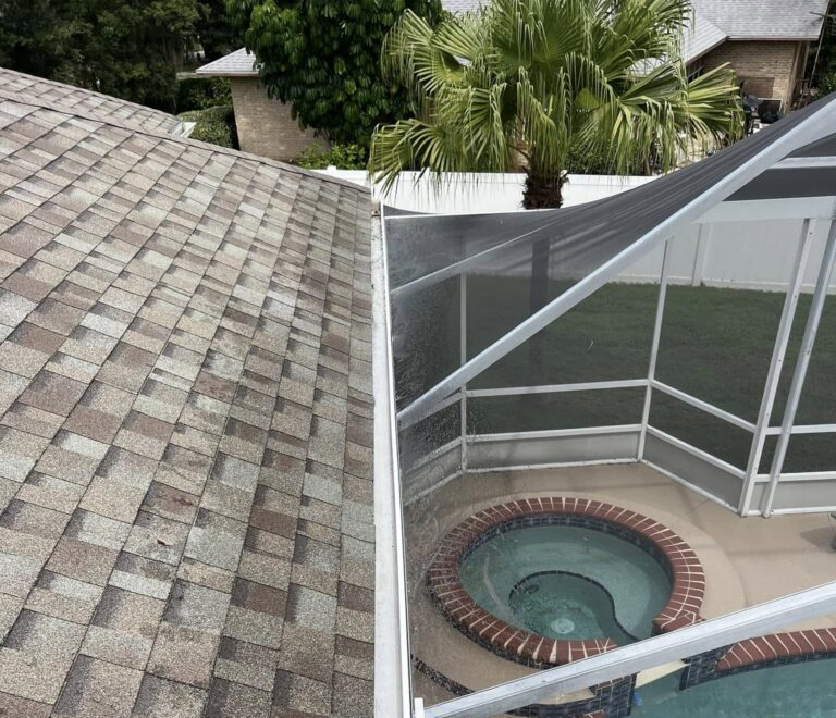 a hot tub and a screen door. Professional gutter cleaning in Central Florida
