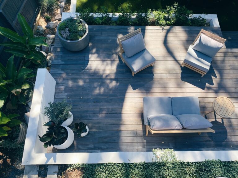Deck Cleaning In Lakeland 4 a clean deck with chairs and a couch. Deck cleaning in Lakeland