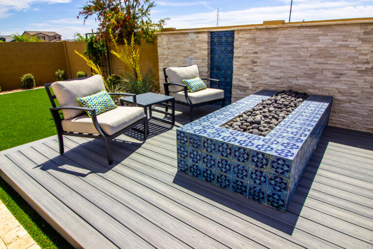 Deck Cleaning In Lakeland 5 a patio with chairs and a fire pit. The best deck cleaning in Central Florida
